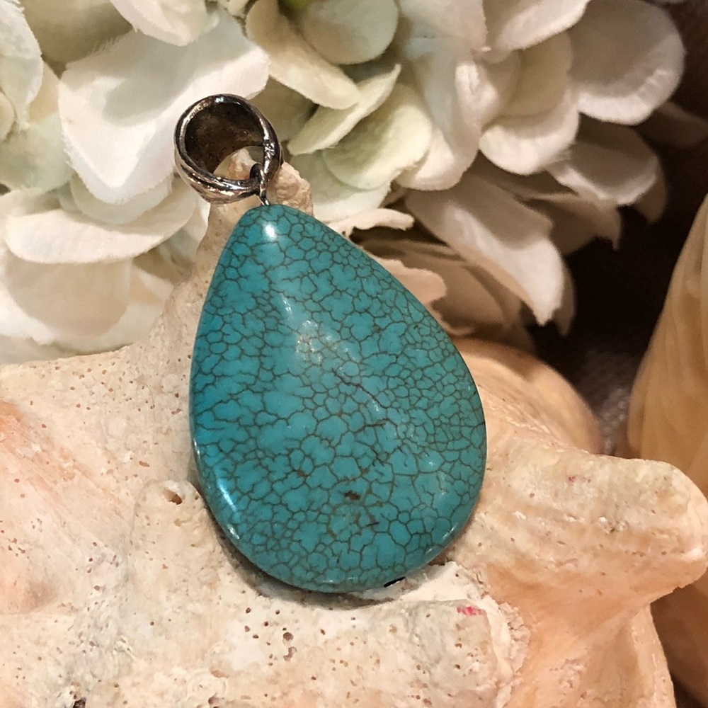 Turquoise colored pendant